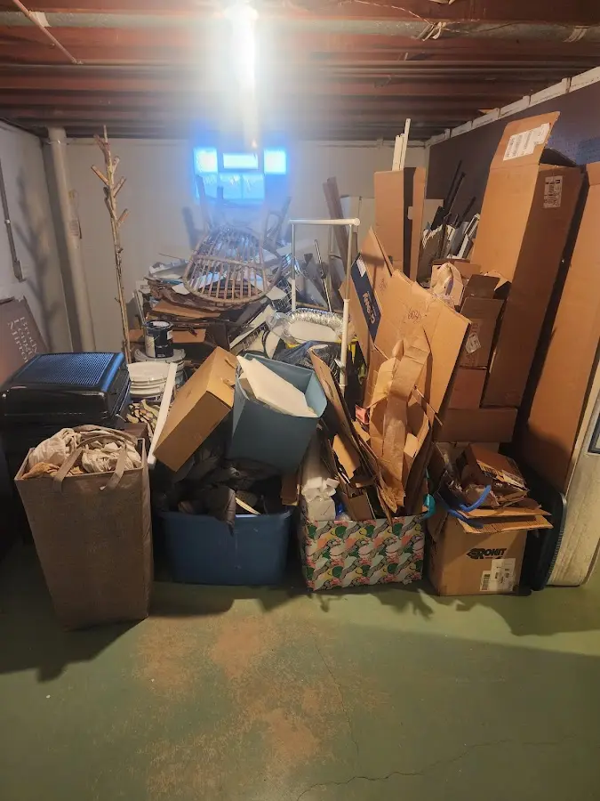 Roll-off dumpster container at job site for Yard Waste Dumpster Rental in Sterling